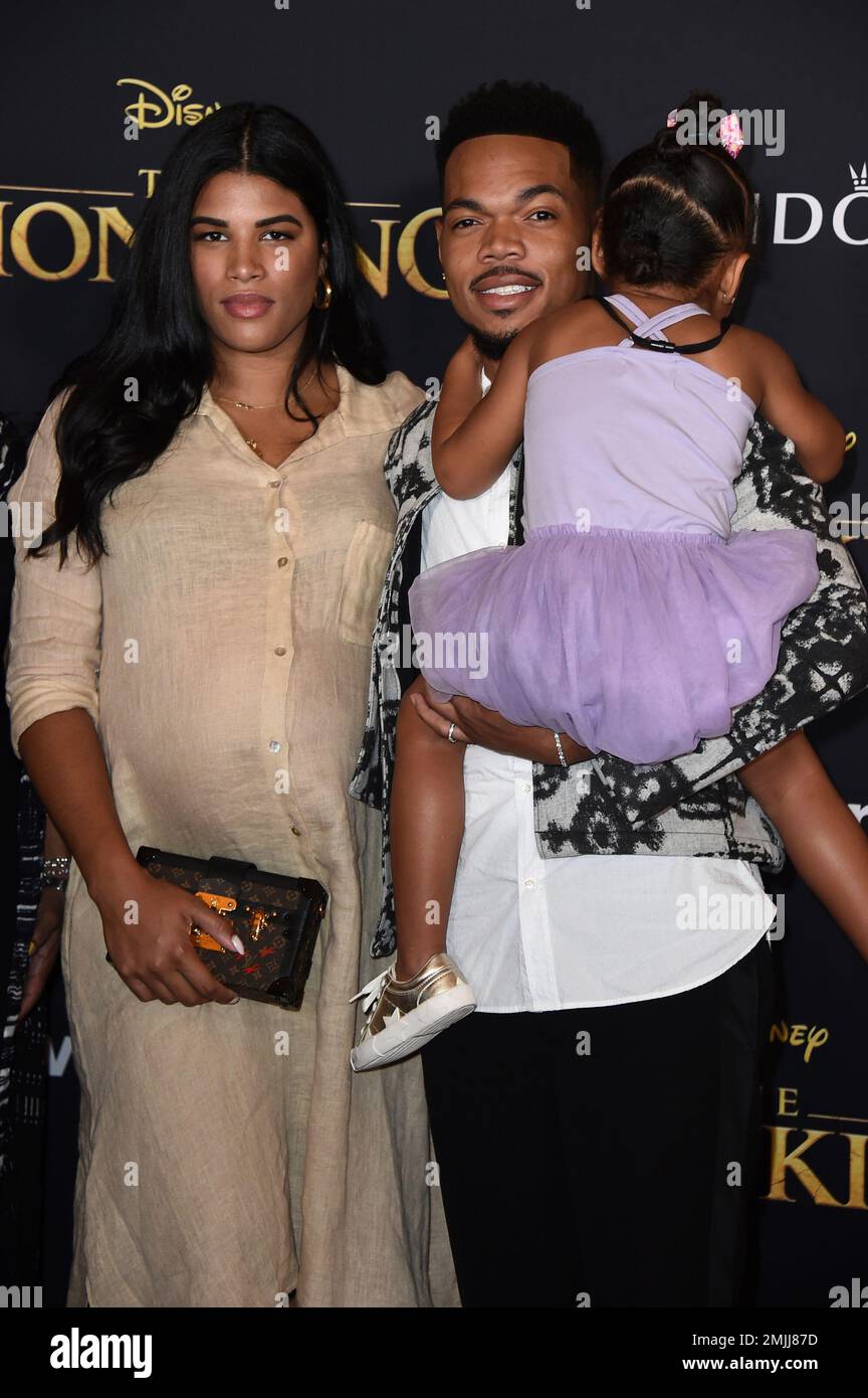 Chance the Rapper and Kirsten Corley, left, pose with daughter Kensli ...