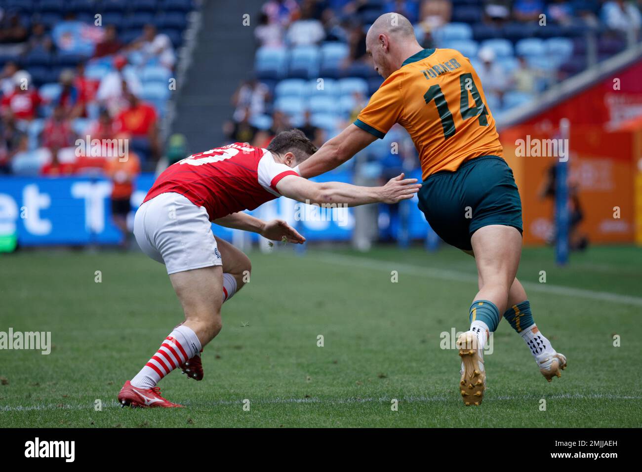 James Turner of Australia is tackled during the 2023 Sydney Sevens match between Australia and Great Britain at Allianz Stadium on January 27, 2023 in Sydney, Australia Stock Photo