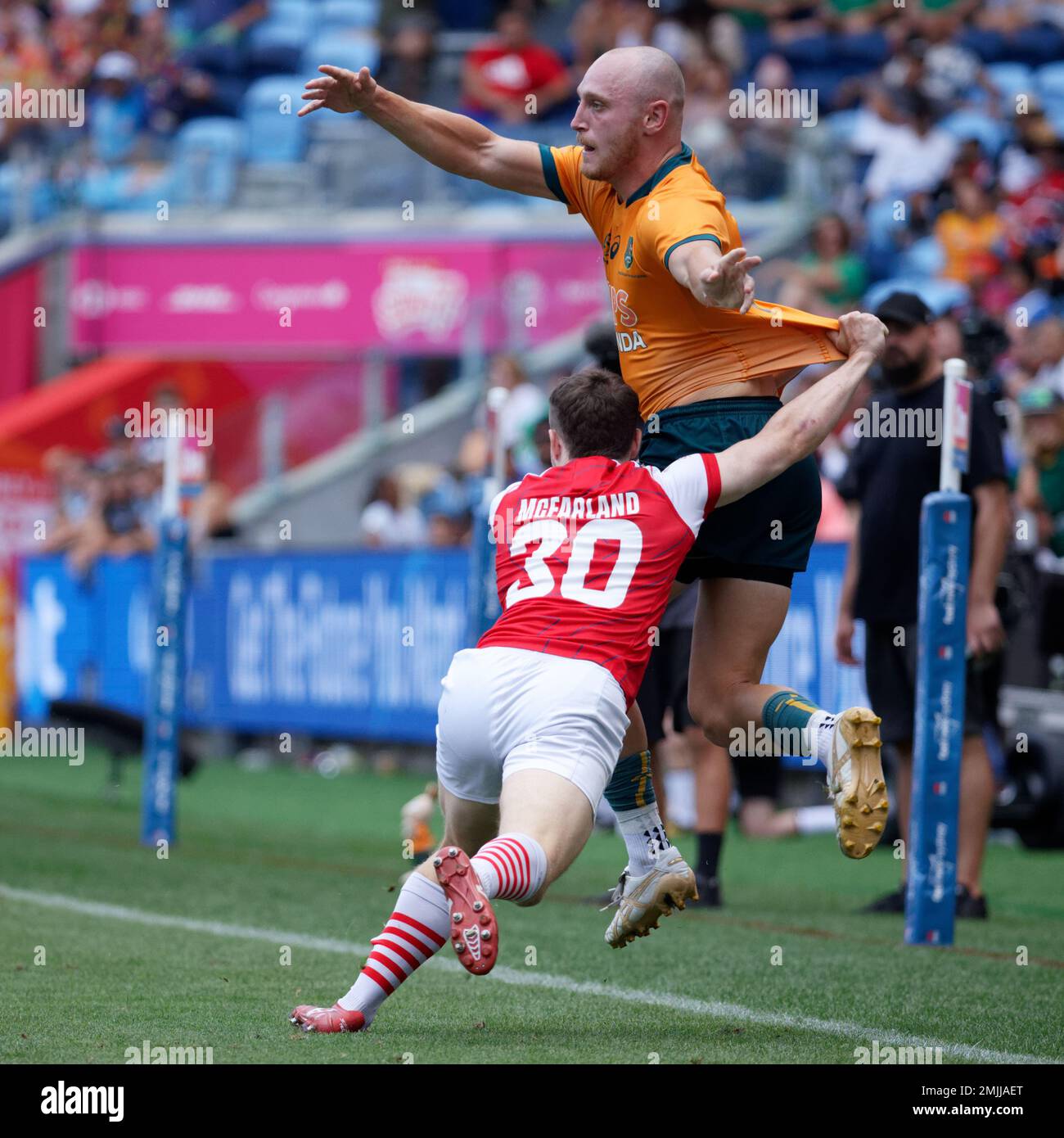 James Turner of Australia is tackled during the 2023 Sydney Sevens match between Australia and Great Britain at Allianz Stadium on January 27, 2023 in Sydney, Australia Stock Photo