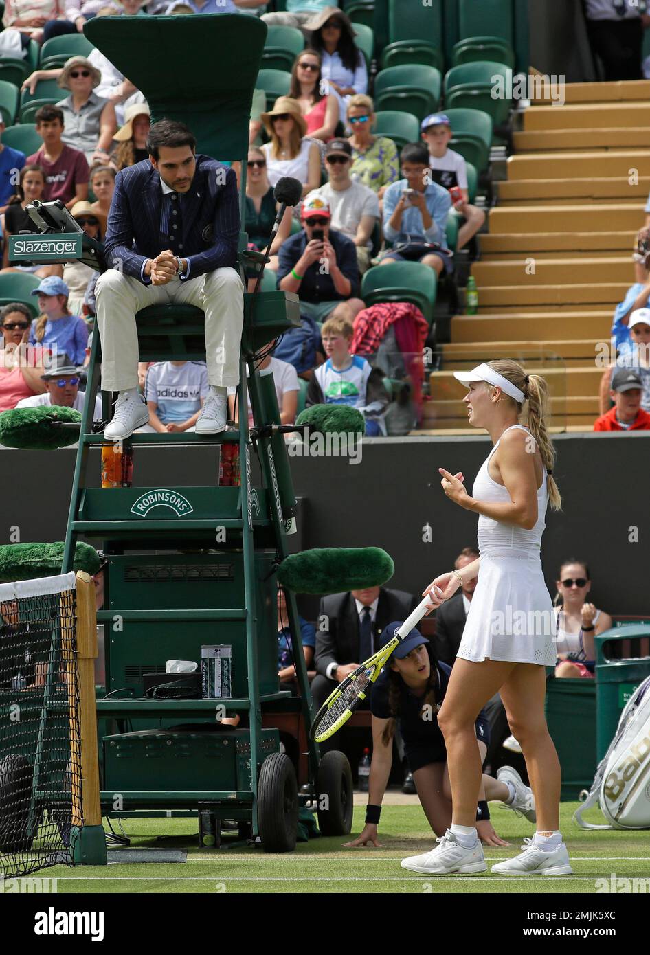 Denmark's Caroline Wozniacki remonstrates with umpire Nacho Forcadell