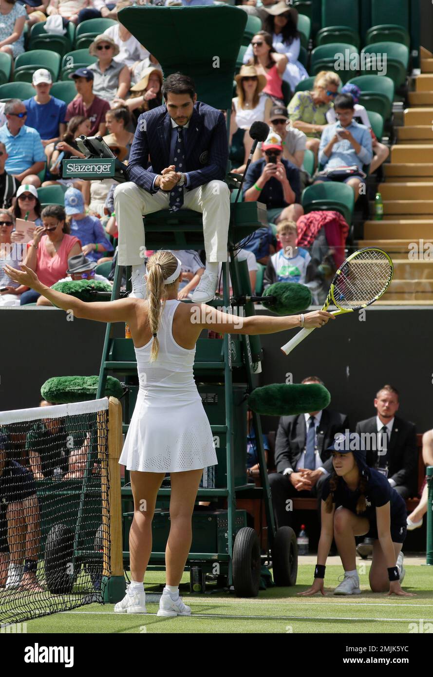 Denmark's Caroline Wozniacki remonstrates with umpire Nacho Forcadell