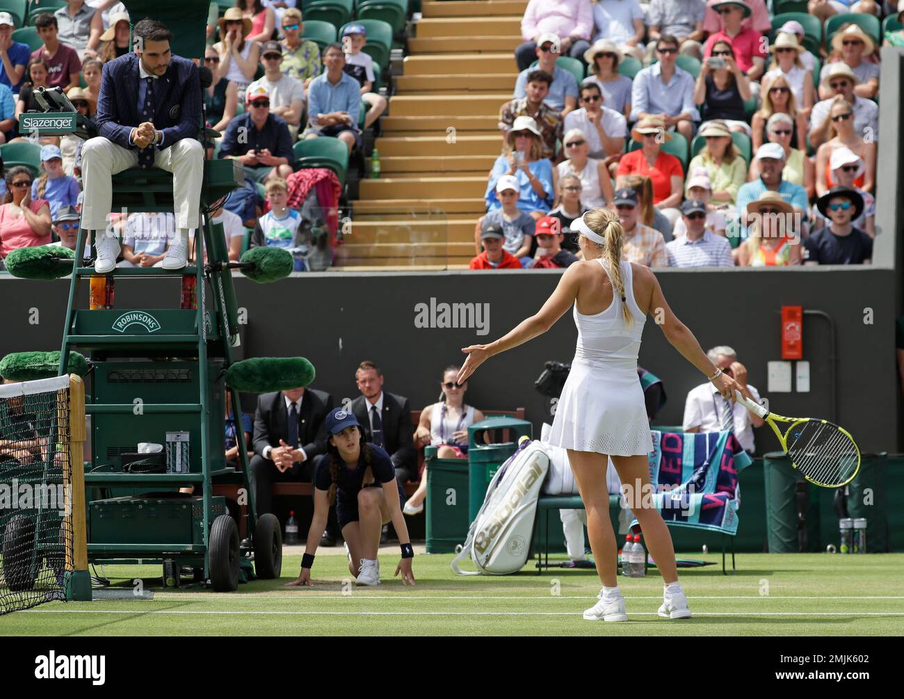 Denmark's Caroline Wozniacki remonstrates with umpire Nacho Forcadell
