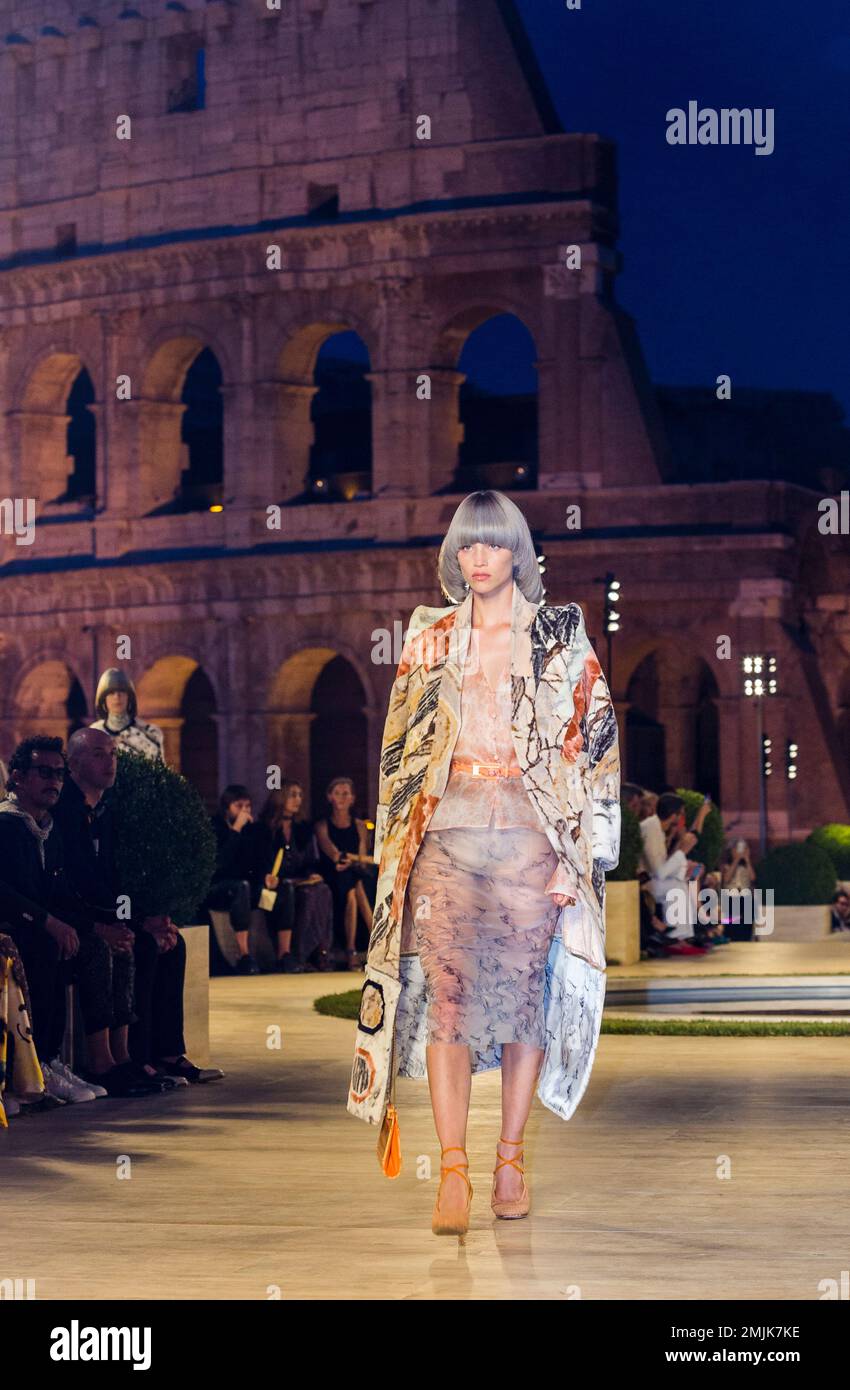 A model for Fendi presents the Fall Winter 2019 2020 collection The dawn of Romanity during a couture runaway show in front of Rome s Colosseum Thursday Jul. 4 2019. The show is meant to pay