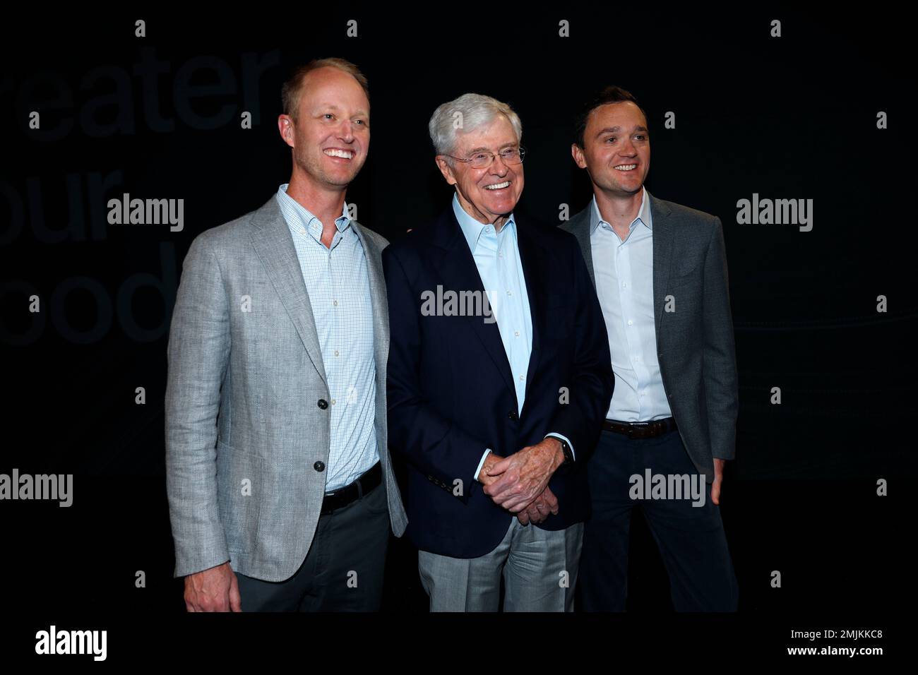 In this Saturday, June 29, 2019, file photograph, from left, Chase Koch, his father Charles Koch