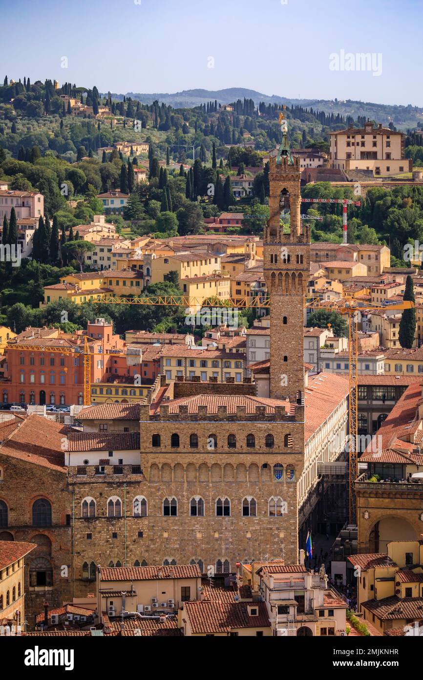 Palazzo Vecchio palace and red rooftops from Brunelleschi dome of Duomo Cathedral or Cattedrale di Santa Maria del Fiore, Florence, Italy, aerial view Stock Photo