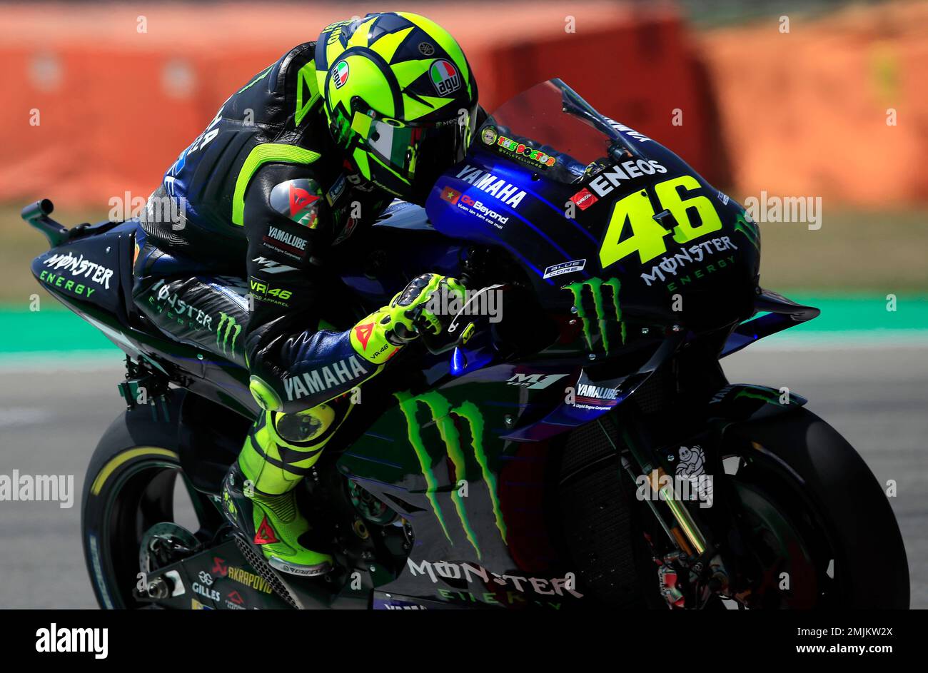 Italian rider Valentino Rossi of the Monster Energy Yamaha MotoGP steers  his motorcycle at the MotoGP race during the Dutch Grand Prix in Assen,  northern Netherlands, Sunday, June 30, 2019. (AP Photo/Peter