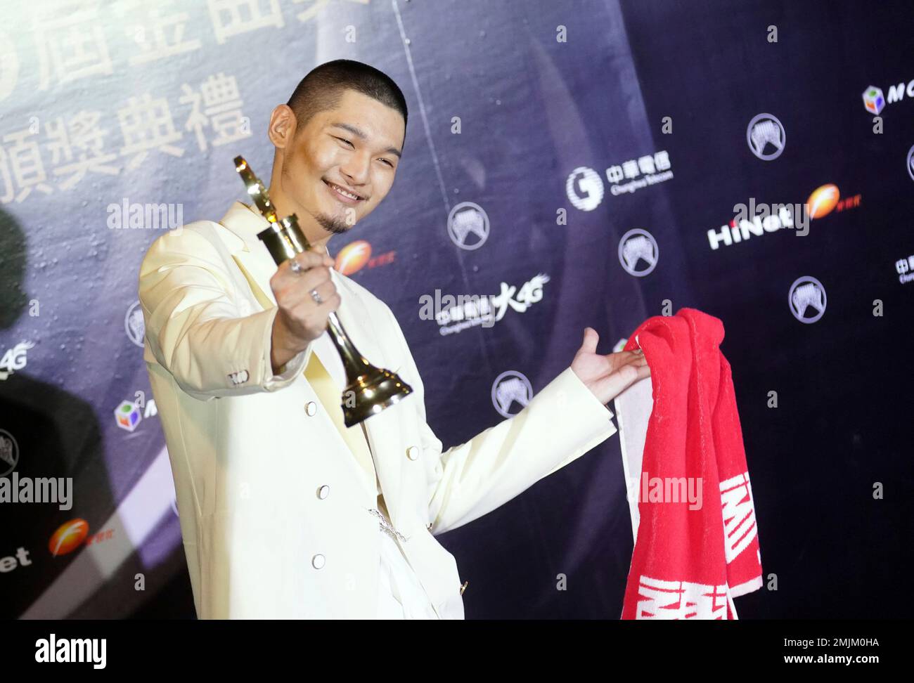 Taiwanese singer Leo Wang holds his award for the Best Male Mandarin  Vocalist at the 30th Golden Melody Awards in Taipei, Taiwan, Saturday, June  29, 2019. The Golden Melody Awards are one