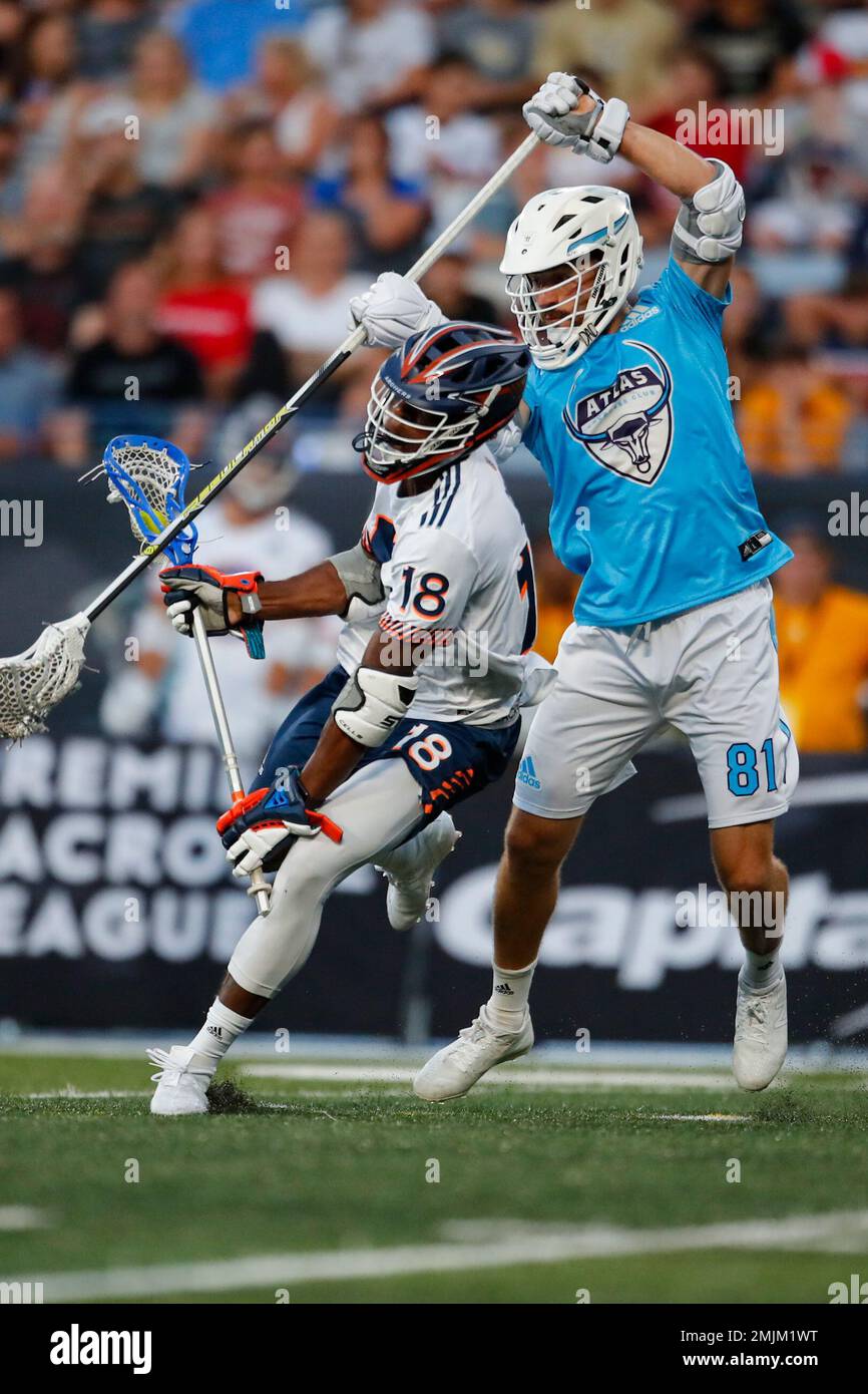 IMAGE DISTRIBUTED FOR PREMIER LACROSSE LEAGUE - Archers midfielder Austin  Sims (18) is defended by Atlas defender Kyle Hartzell (81)during a Premier  Lacrosse League game on Friday, June 28, 2019 in Atlanta. (