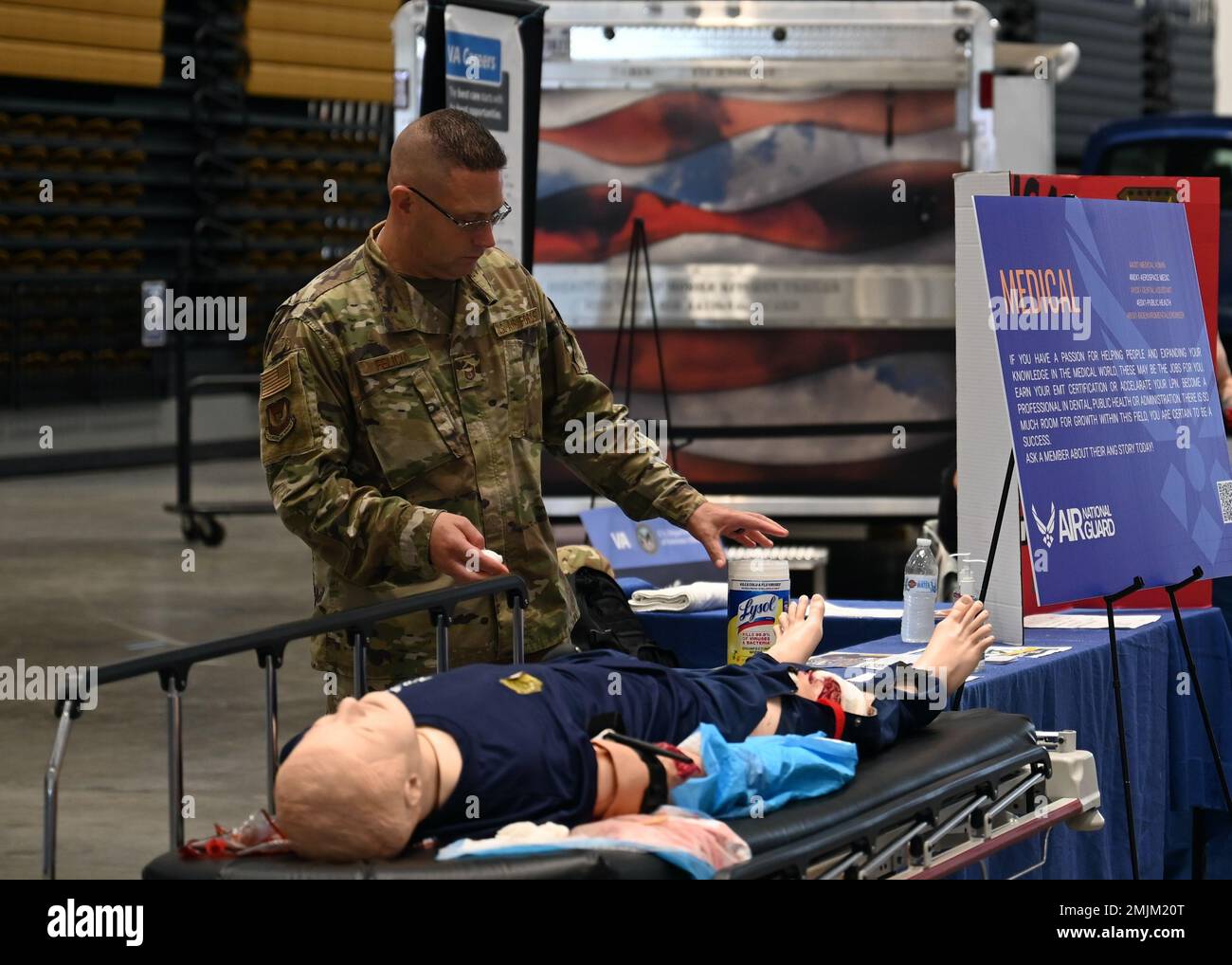 Master Sgt. Jeremy Felicia, a member of the New York Air  National Guard's 174th Attack Wing Medical Group, prepares his medical equipment exhibit before visitors enter the Exposition Center at the New York State Fair in Geddes, New York near Syracuse on  August 31, 2022.  The exhibit will run until Sept. 5. Stock Photo