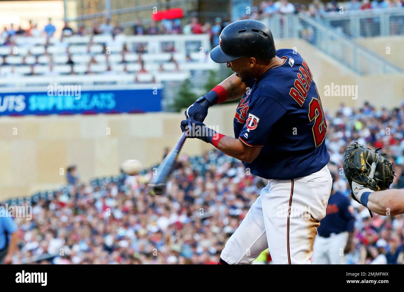 Minnesota Twins' Eddie Rosario hits an RBI single off Tampa Bay Rays