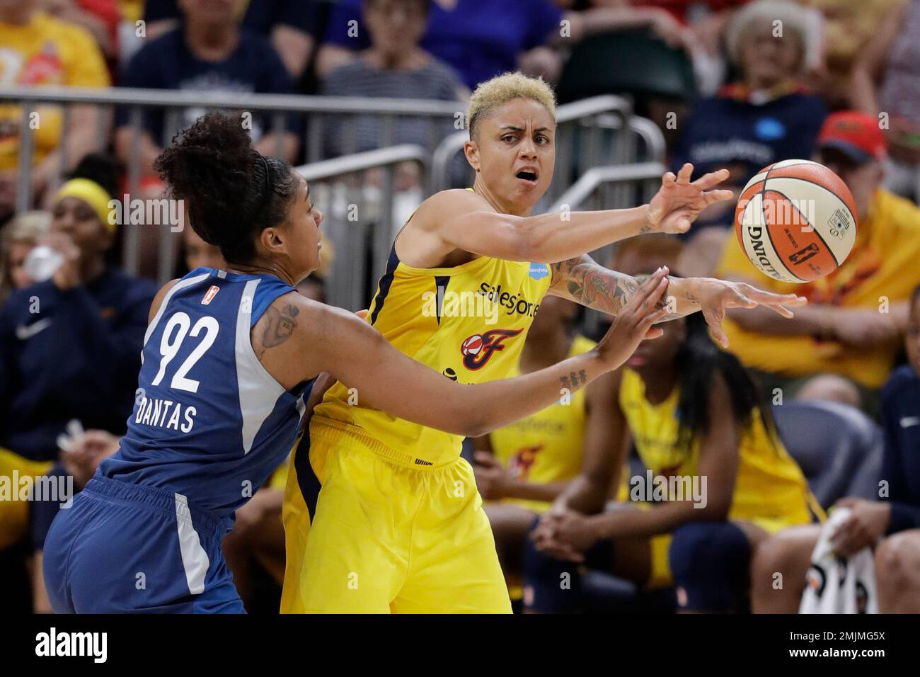 Indiana Fever's Candice Dupree (4) passes against Minnesota Lynx's