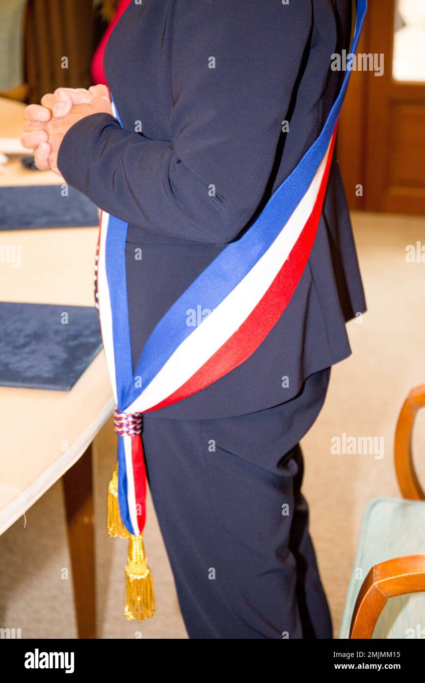 view of the tricolor scarf flag of mayor during celebration in France Stock Photo