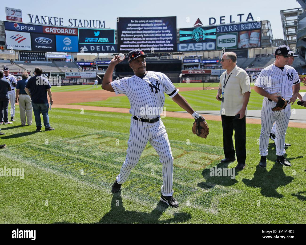 Former New York Yankee Willie Randolph warms up during Old Timer's Day