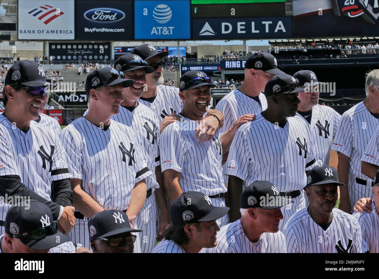Former New York Yankees players, including Mariano Rivera, center, pose for  a picture during Old Timer's Day at Yankee Stadium, Sunday, June 23, 2019,  in New York. (AP Photo/Seth Wenig Stock Photo 