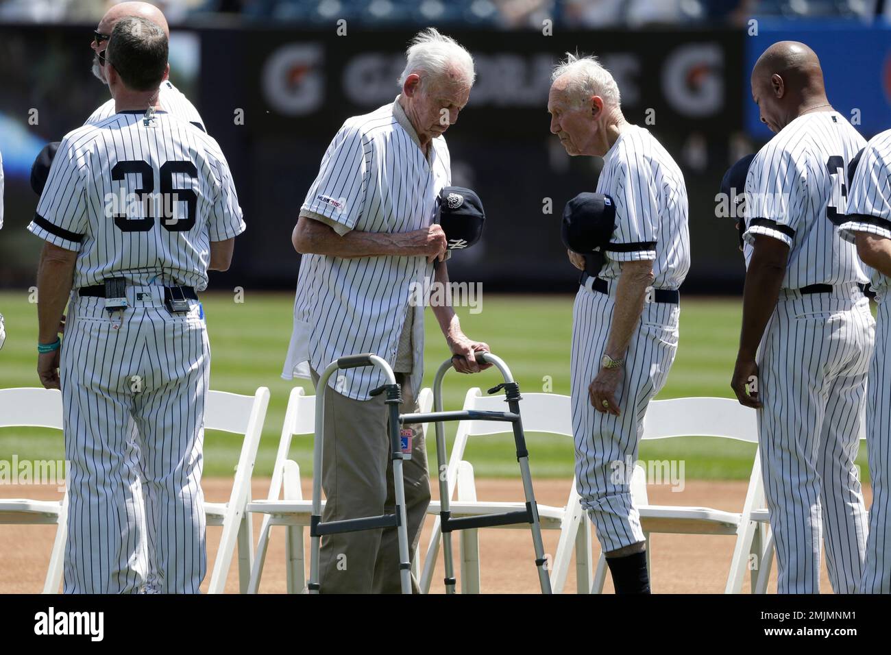 Former New York Yankees Don Larson, left, and Bobby Brown, participate