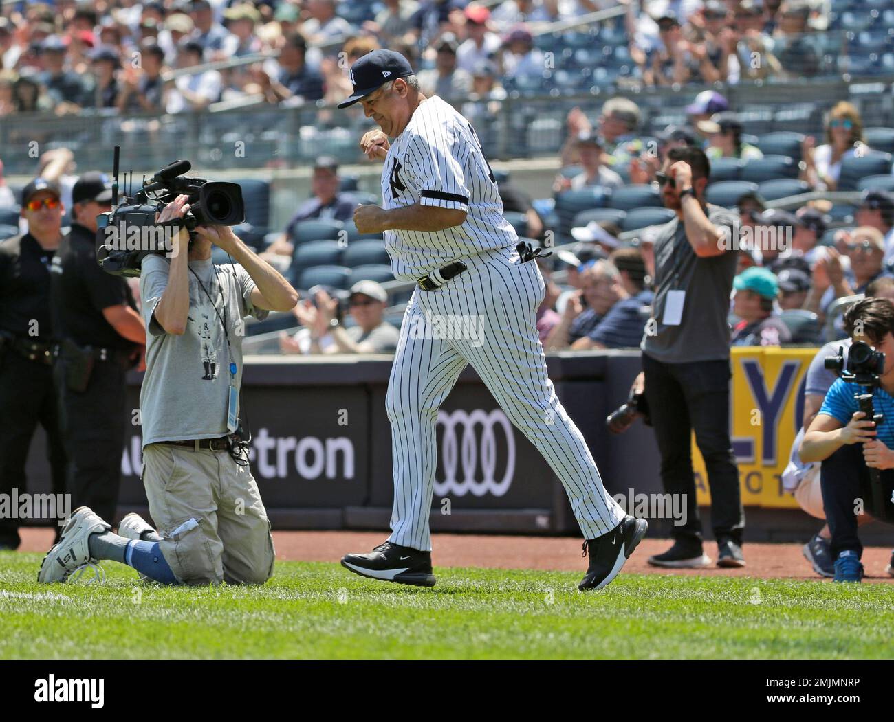 Former New York Yankee Luis Sojo is introduced during Old Timer's Day