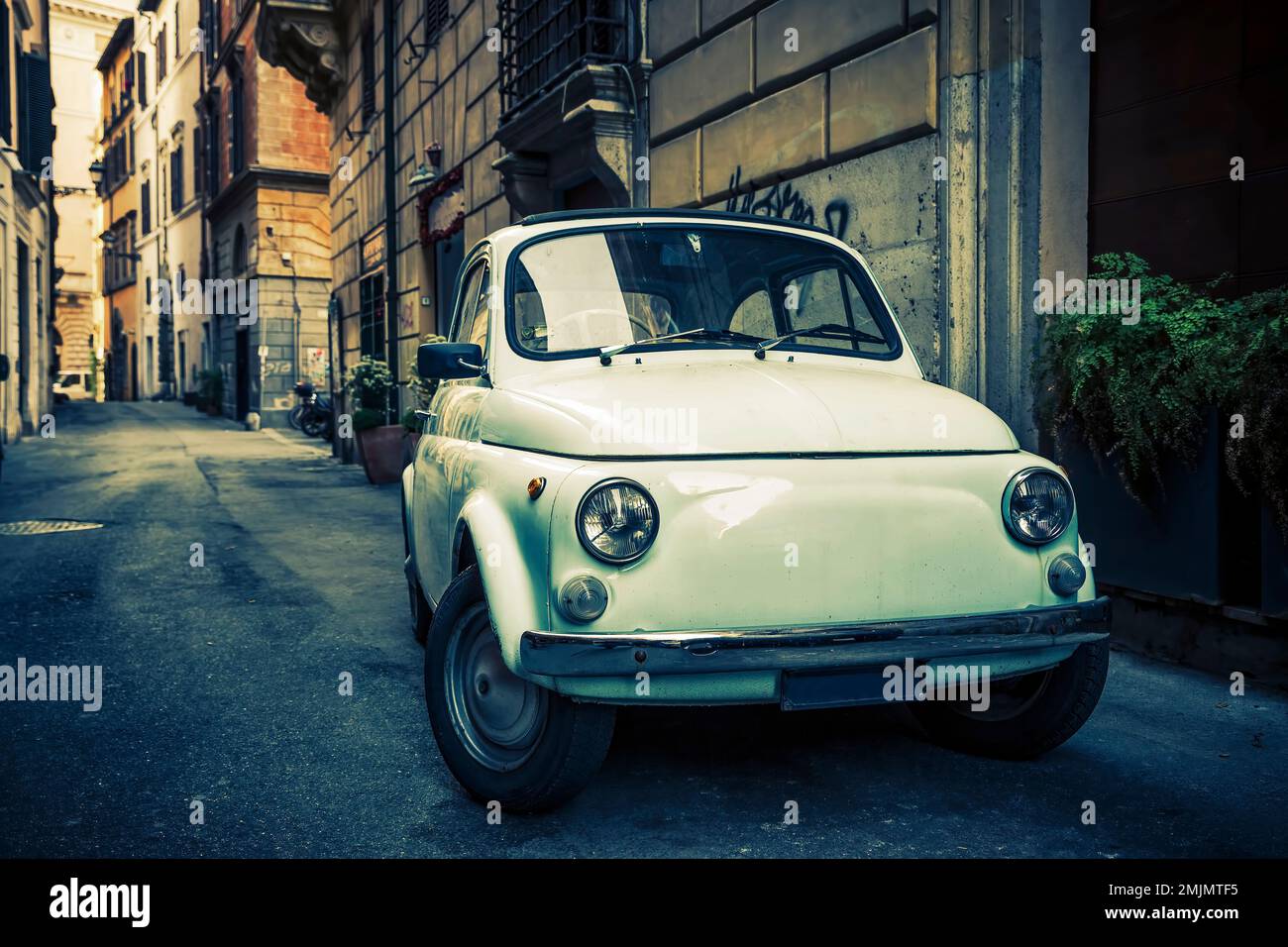 ROME - MAY 27, 2016: A Fiat 500 on September 13, 2011 in Rome. Launched as the Nuova (new) 500 in July 1957, it was marketed as a cheap and practical Stock Photo
