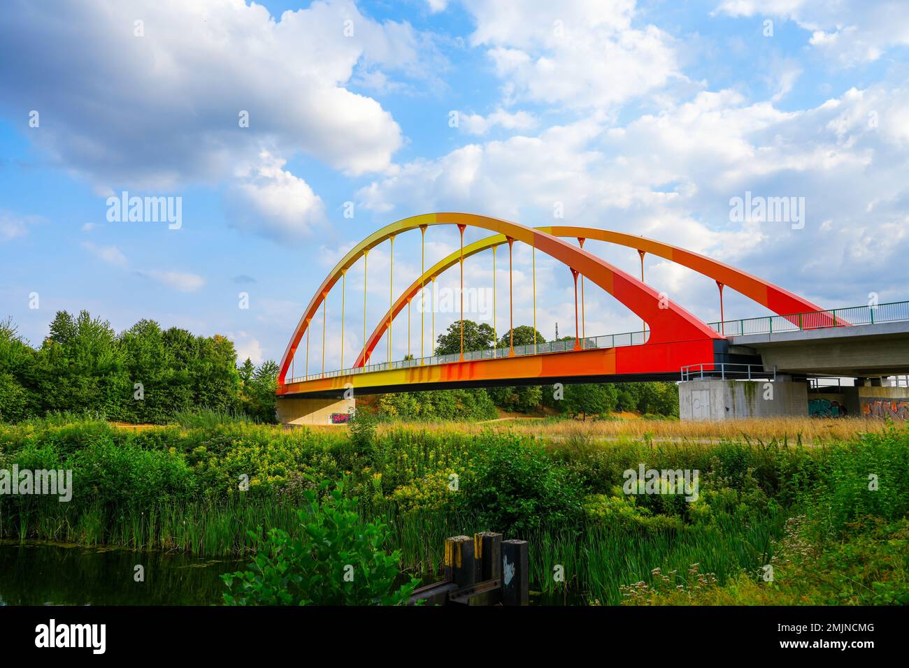 Bridge Dattelner Meerbogen near Datteln on the canal. Arched bridge in bright colors on the Dattelner Meer. Stock Photo