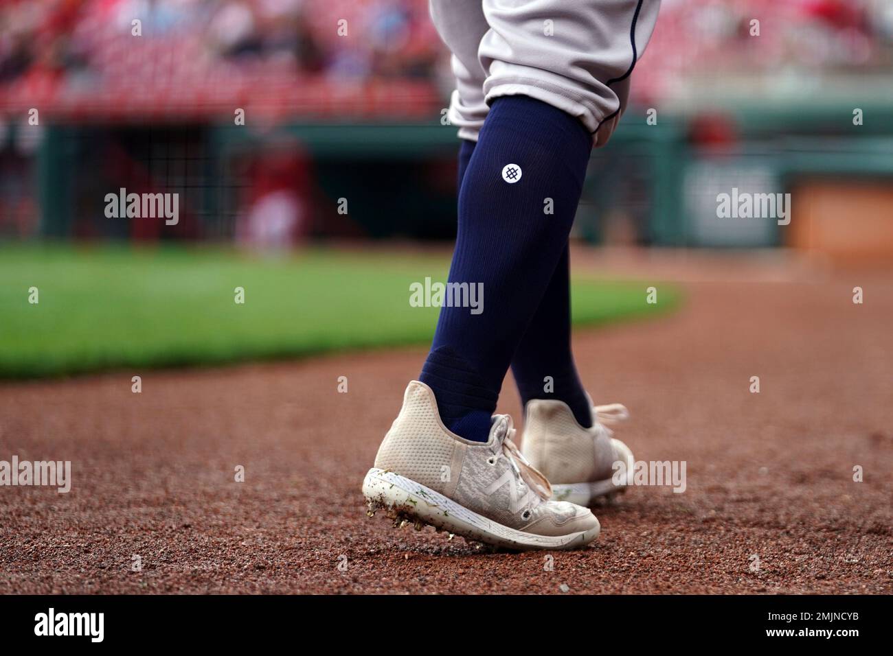 The Stance socks and New Balance cleats worn by New York Mets' Francisco  Lindor are seen as he stands on the dugout steps during a baseball game  against the Cincinnati Reds in