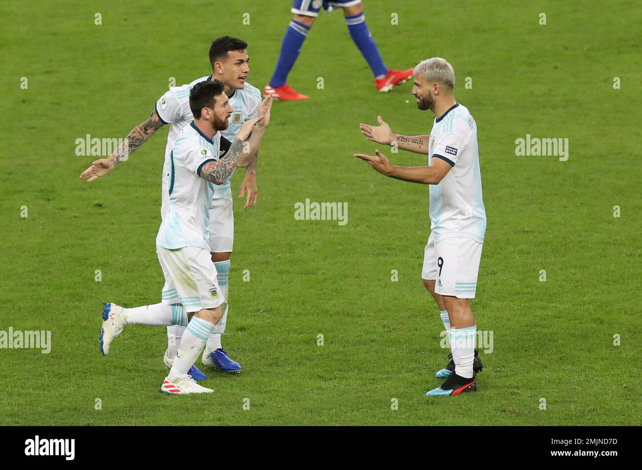 Lionel Messi of Argentina celebrates with teammate Sergio Agüero