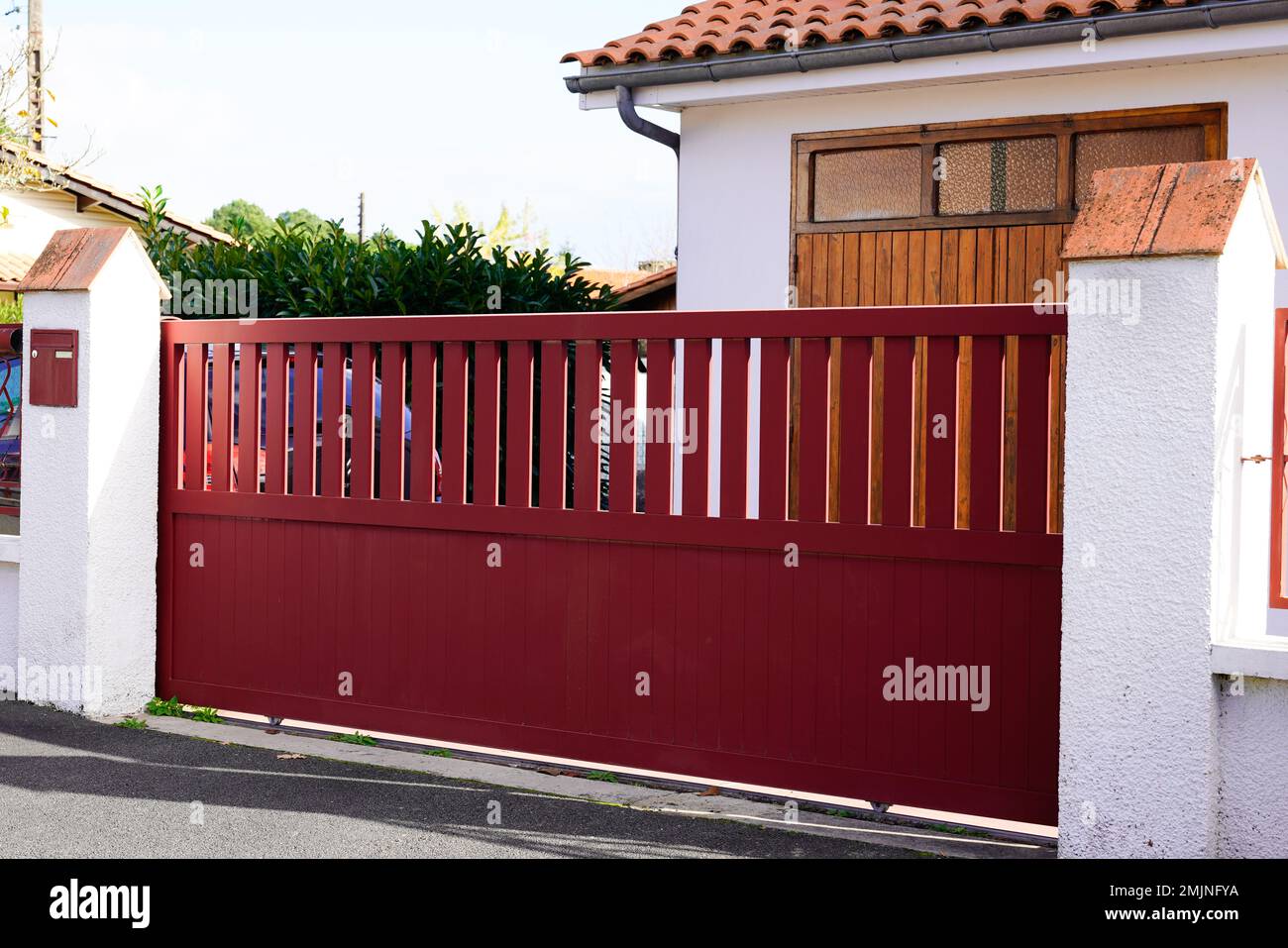 red design classical home metal aluminum gate of modern house Stock Photo