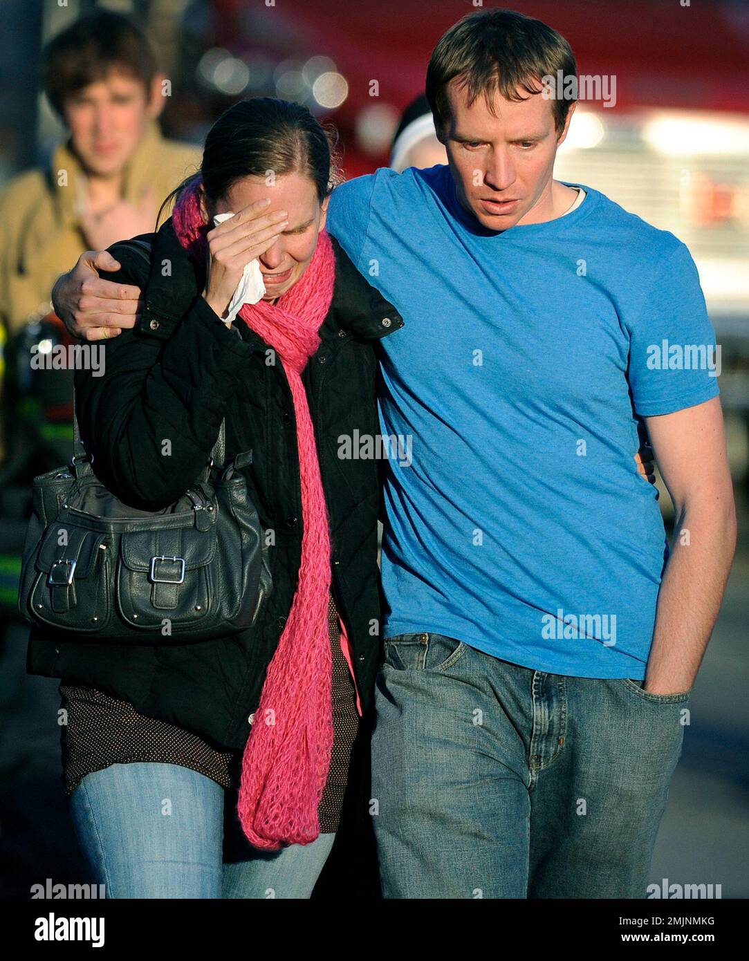 FILE- In this Dec. 14, 2012 file photo, Alissa Parker grieves with ...