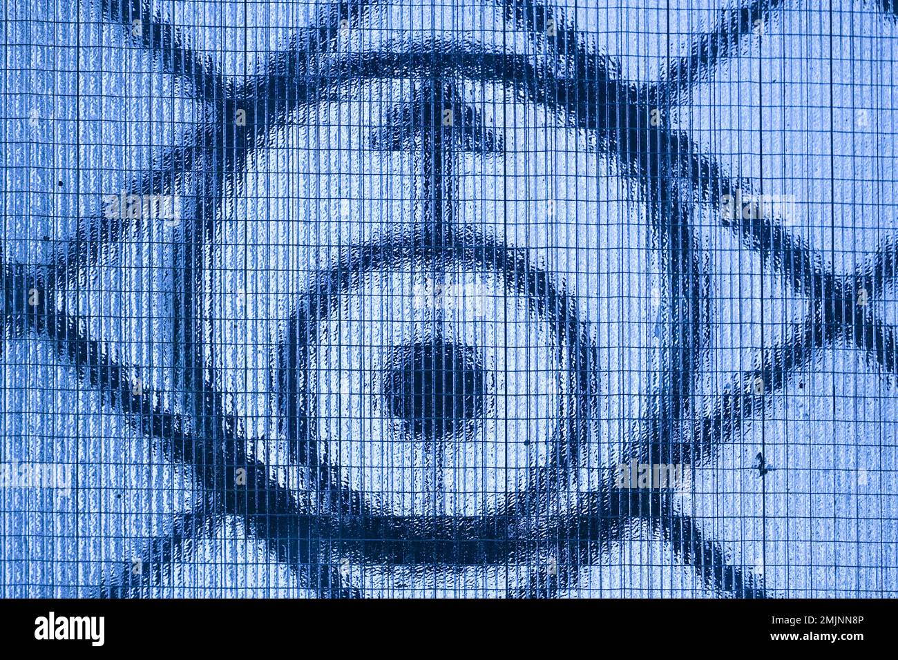 Berlin, Germany. 27th Jan, 2023. The symbol for the planet Uranus is behind a window pane of the Wilhelm Foerster Observatory in Berlin-Schöneberg. The planetarium on the Insulaner celebrates its 60th anniversary. Credit: Jens Kalaene/dpa/Alamy Live News Stock Photo