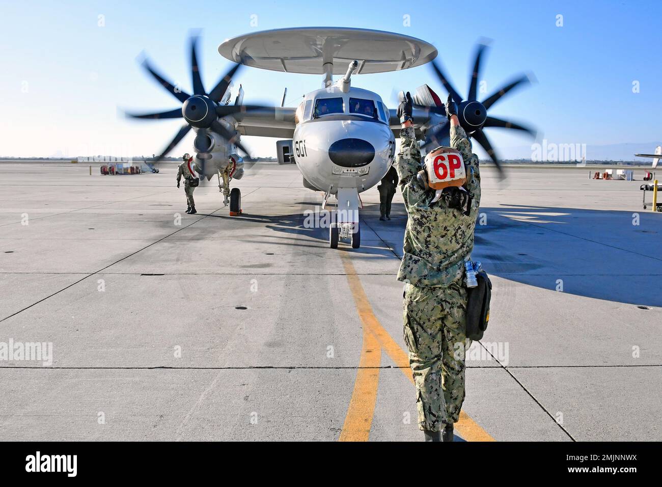 220831-N-AS200-1069 - POINT MUGU, Calif. (Aug. 31, 2022) – Vice Adm. Kenneth Whitesell, Commander, Naval Air Forces (CNAF) co-pilots an E-2D Advanced Hawkeye assigned to the  “Black Eagles” of Airborne Command and Control Squadron (VAW) 113 during his trip to Naval Base Ventura County (NBVC), Point Mugu, Aug. 31. CNAF mans, trains, and equips deployable, combat-ready Naval Aviation forces for superior combat readiness. NBVC is a strategically located Naval installation composed of three operating facilities: Point Mugu, Port Hueneme and San Nicolas Island. NBVC is the home of the Pacific Seabe Stock Photo