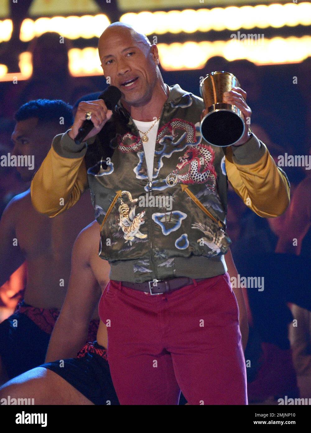 Dwayne Johnson, also known as The Rock, accepts the generation award at