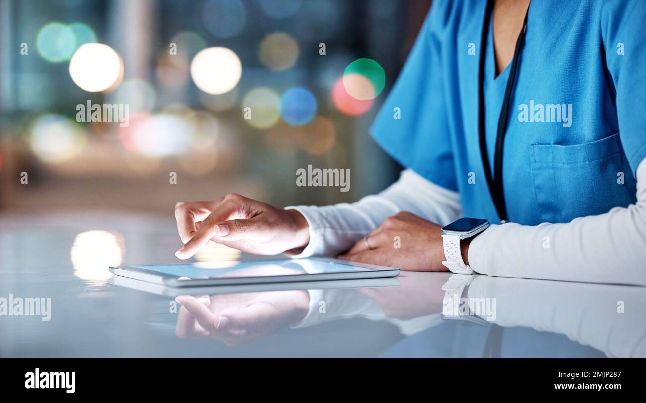 Healthcare, tablet and hands of nurse working online for medical research, planning and schedule in hospital. Telehealth, communication and black Stock Photo