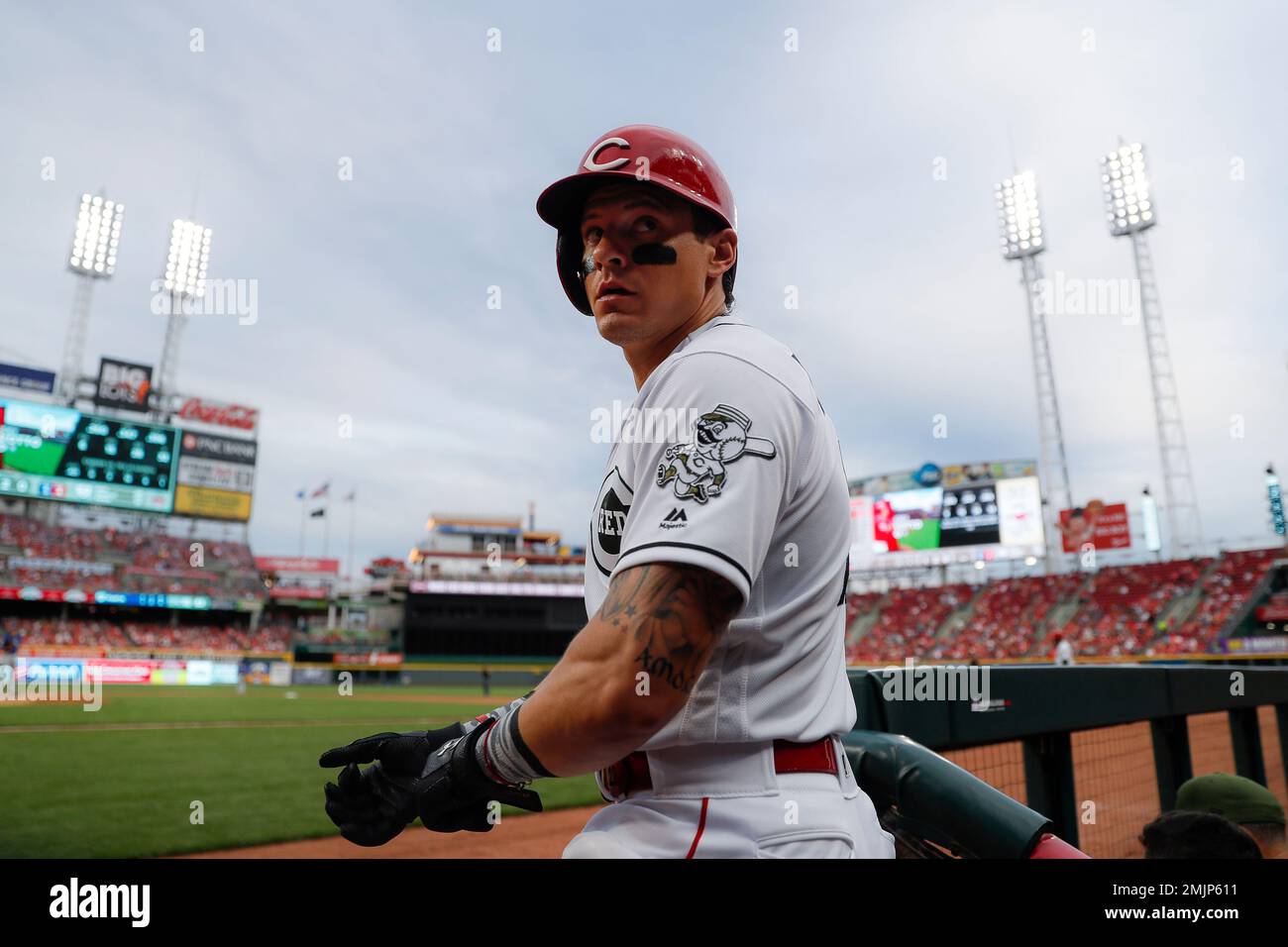 Cincinnati Reds' Derek Dietrich stands in the dugout in the fourth inning of  a baseball game against the Texas Rangers, Friday, June 14, 2019, in  Cincinnati. (AP Photo/John Minchillo Stock Photo - Alamy