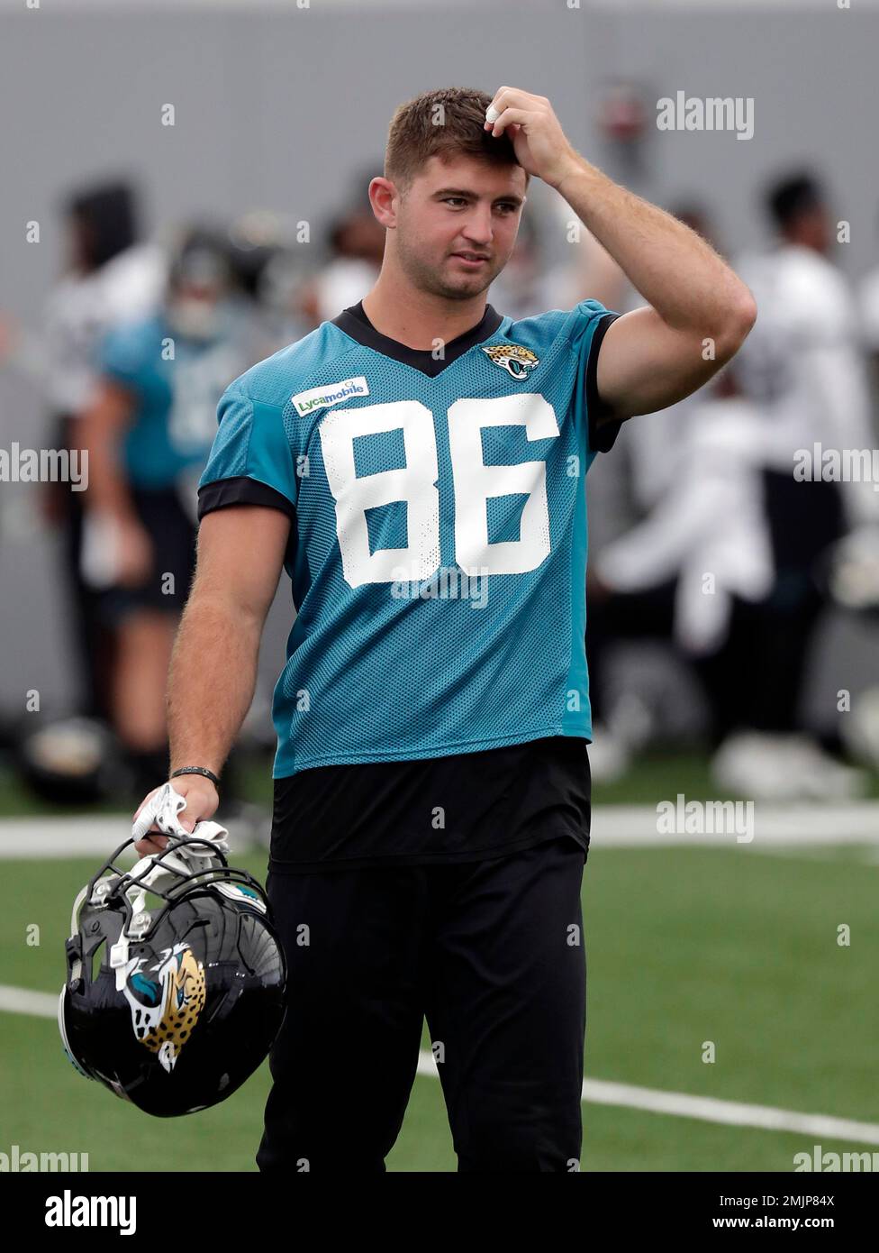 Jacksonville Jaguars tight end Michael Colubiale takes the field