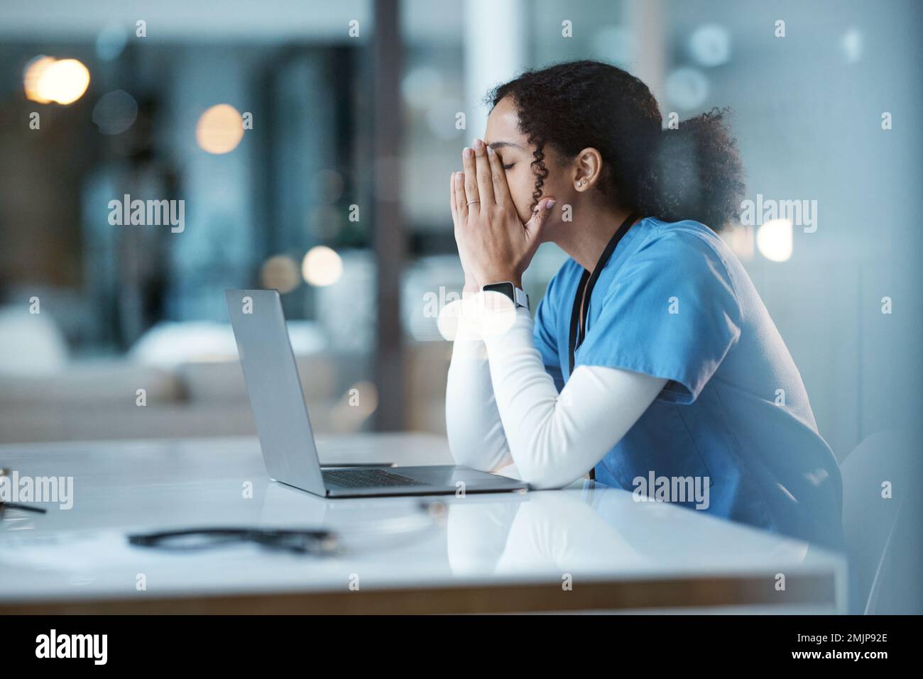 Burnout stress, nurse and black woman in hospital feeling pain, tired