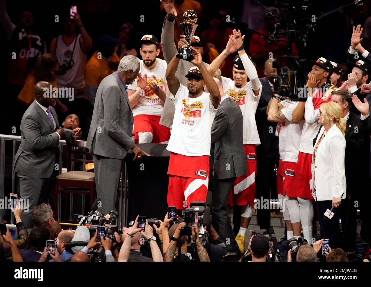 Toronto Raptors forward Kawhi Leonard raises the MVP trophy after the ...