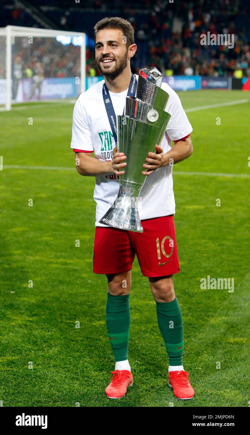 Portugal's Bernardo Silva poses with the trophy at the end of the UEFA