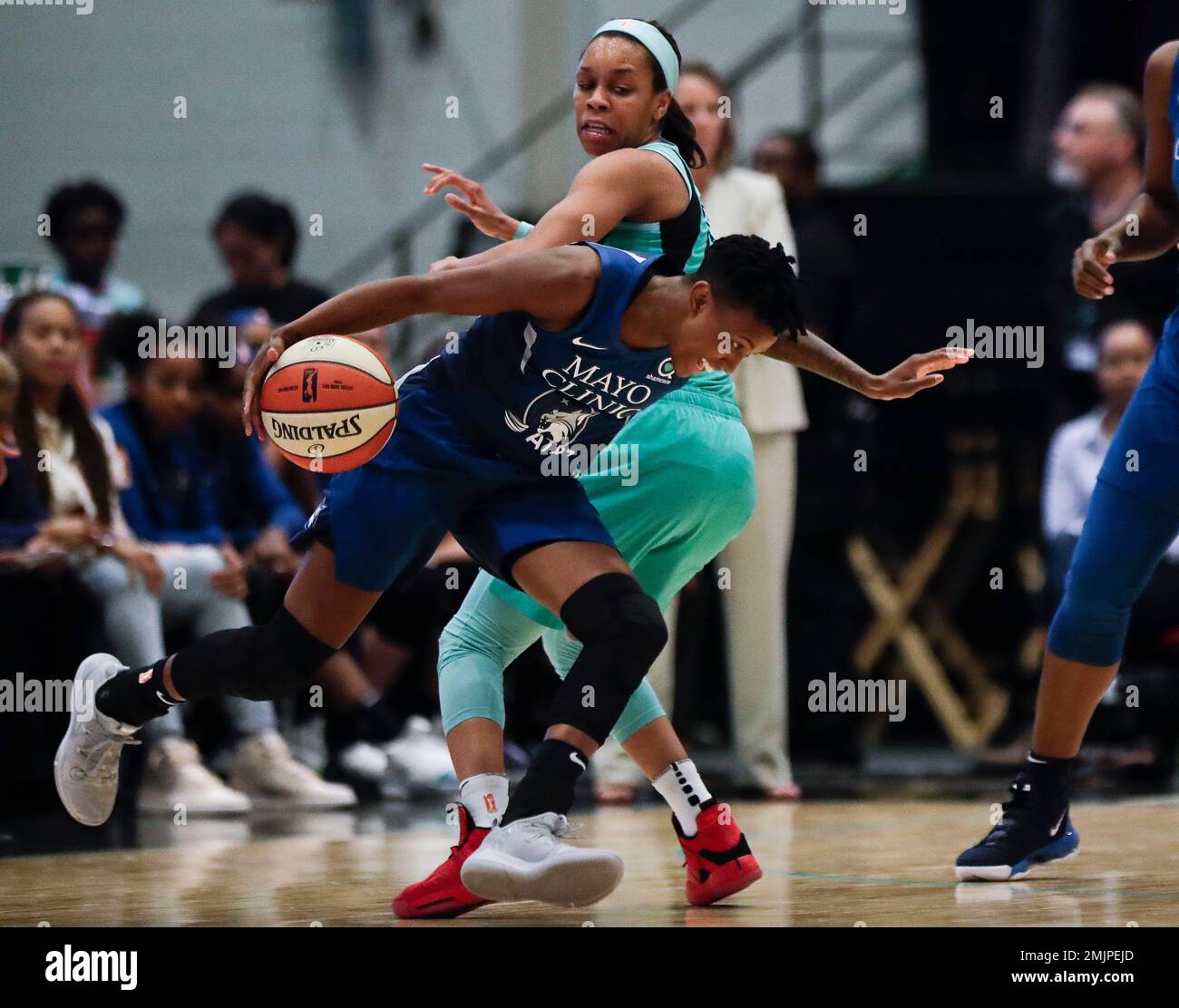 Minnesota Lynx's Danielle Robinson, front, drives past New York Liberty's  Asia Durr during the first half of a WNBA basketball game Wednesday, June  12, 2019, in White Plains, N.Y. The Liberty won