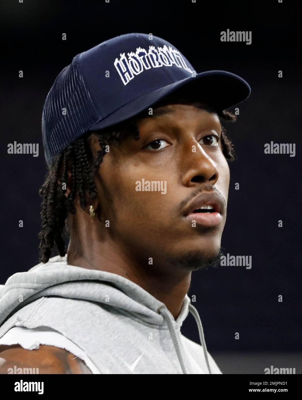 Dallas Cowboys defensive end Taco Charlton (97) watches the team work out  from the sideline at the team's NFL football training facility in Frisco,  Texas, Tuesday, June 11, 2019. (AP Photo/Tony Gutierrez