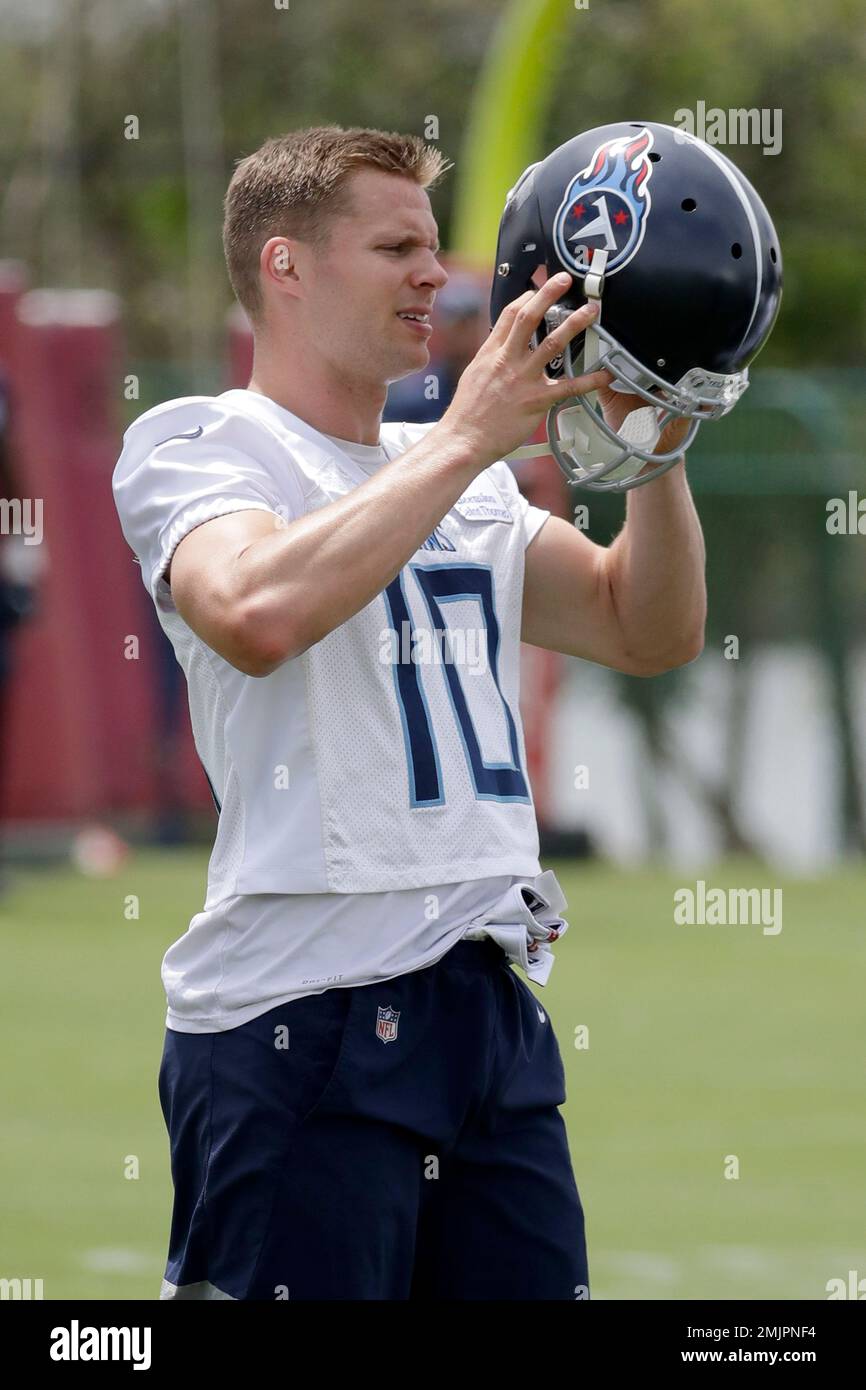 Tennessee Titans wide receiver Adam Humphries puts on his helmet during an  organized team activity at the Titans' NFL football training facility  Tuesday, June 11, 2019, in Nashville, Tenn. (AP Photo/Mark Humphrey