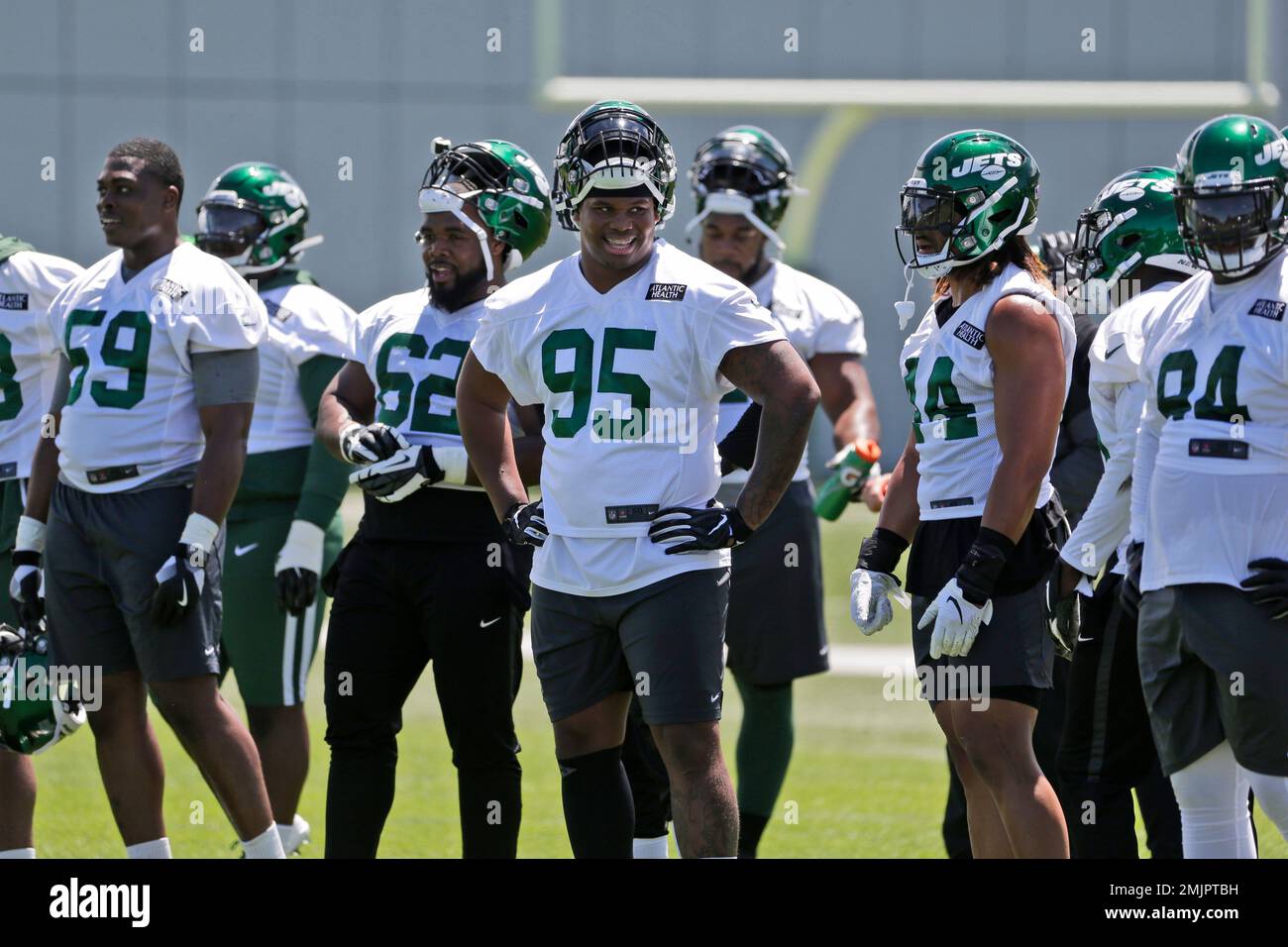 New York Jets Quinnen Williams (95), center, practices at the team's NFL football training