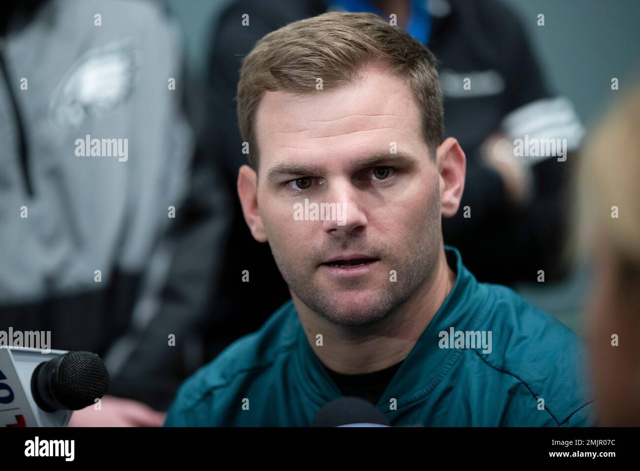 Philadelphia Eagles quarterbacks coach Press Taylor speaks with members