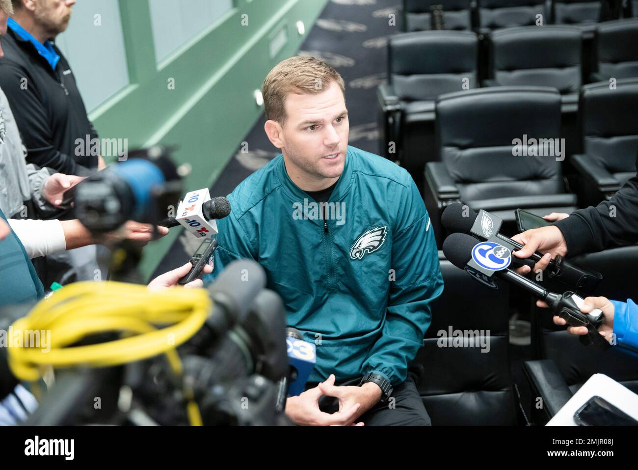 Philadelphia Eagles quarterbacks coach Press Taylor speaks with members