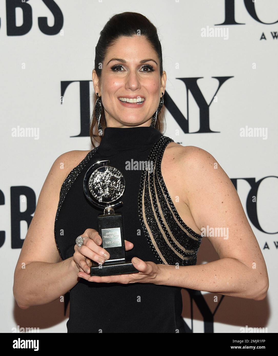 Stephanie J. Block poses in the press room with the award for best