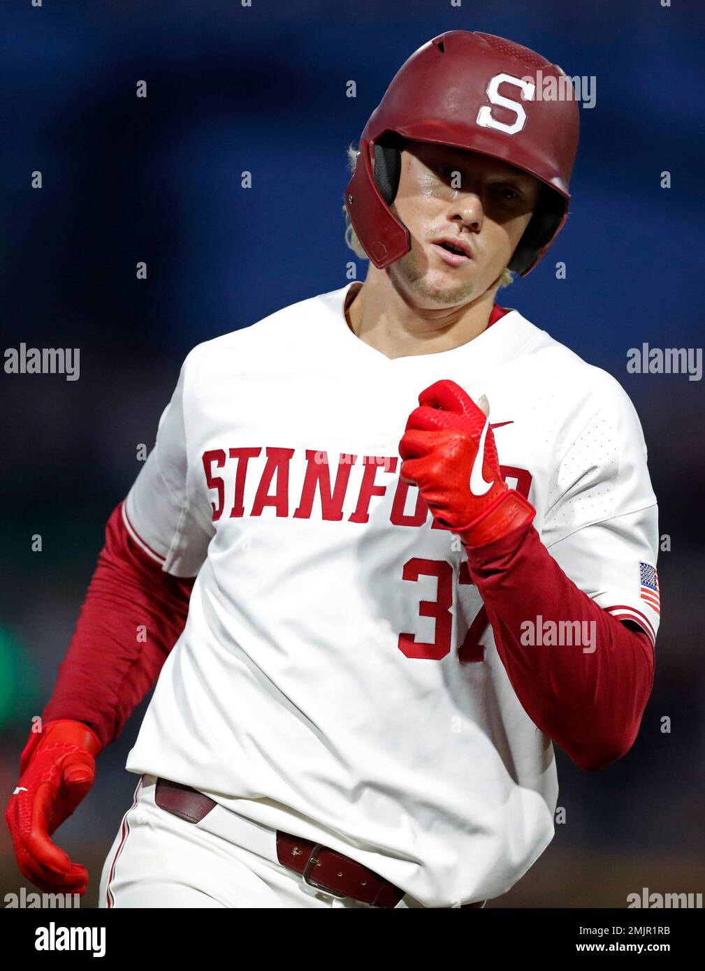 Stanford's Kyle Stowers (37) rounds third base after hitting a