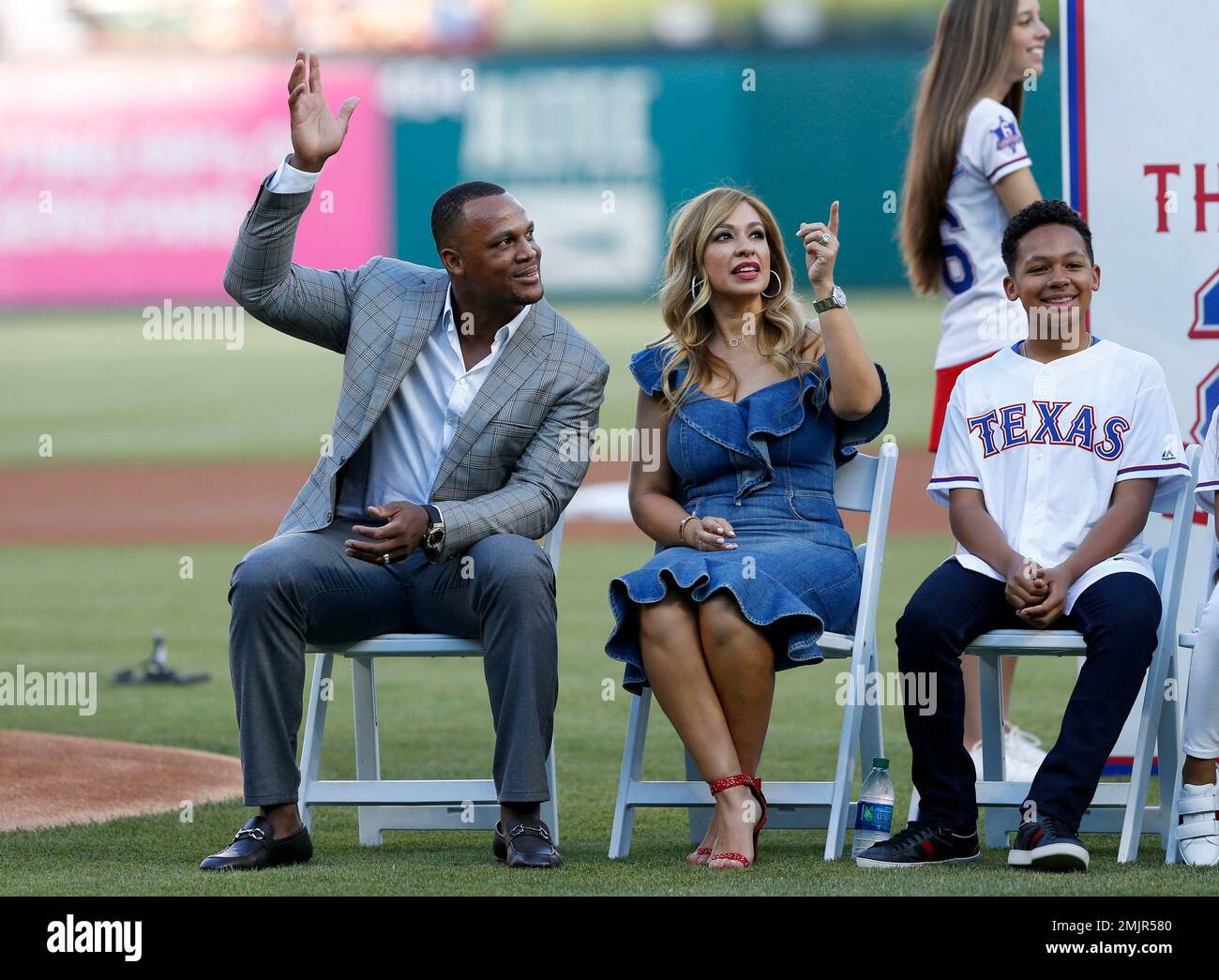 Former Texas Rangers player, Adrian Beltre (left) waves to the