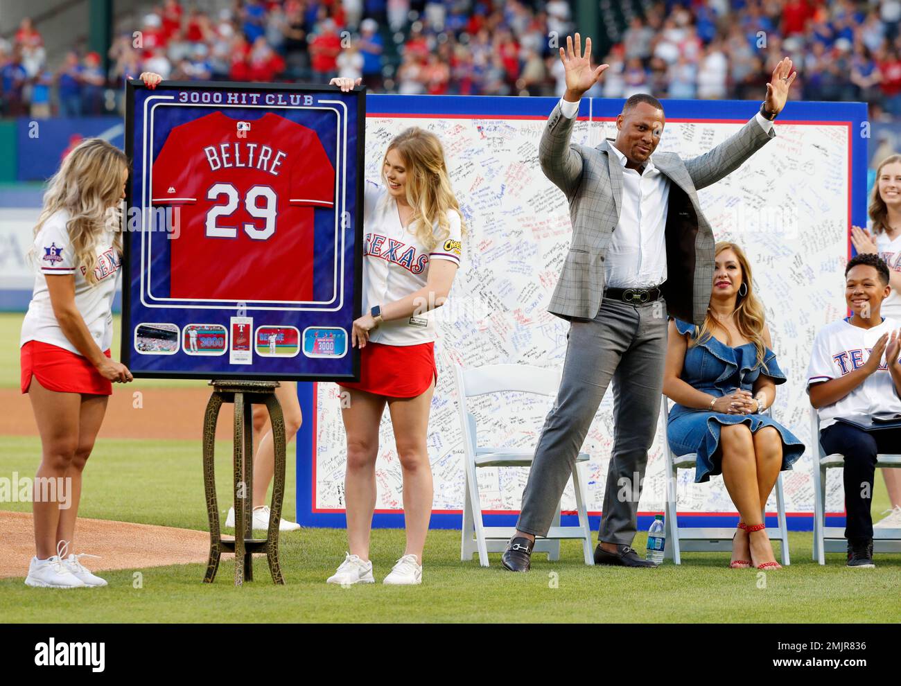 Retired player Adrian Beltre, from left, his wife Sandra, son