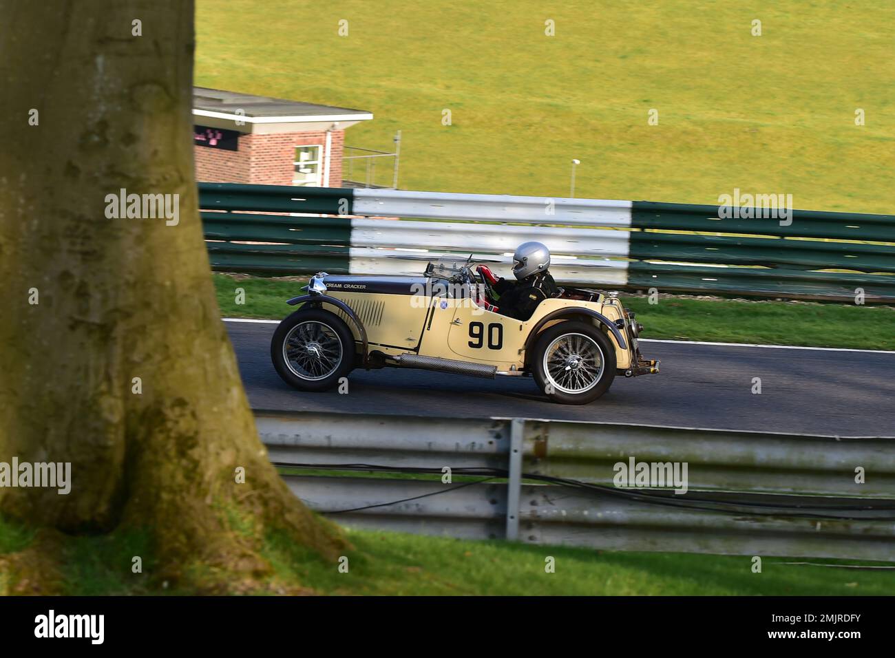 Andy King, MG PB Cream Cracker, Between the trees, Triple M Register Race for Pre-War MG Cars, fifteen minutes of racing for iconic MG Midget, Magna a Stock Photo