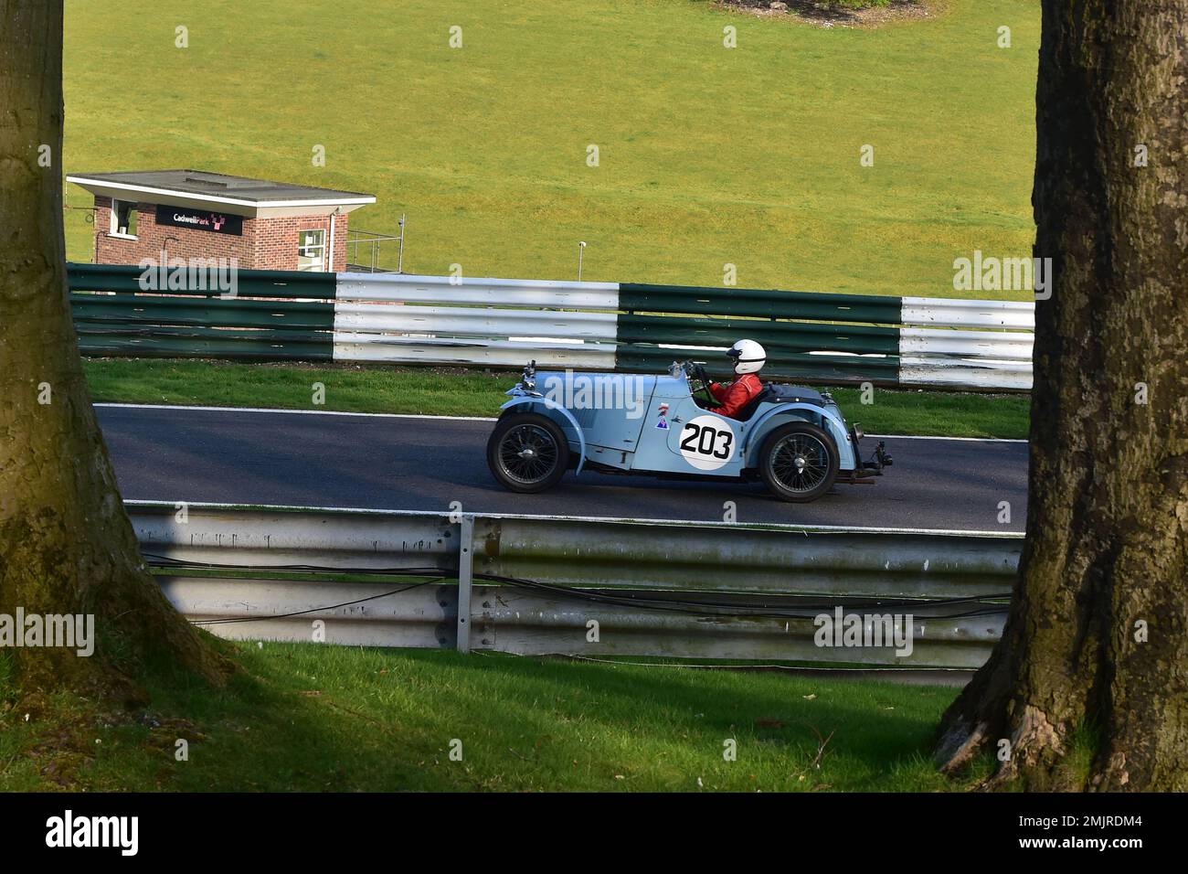 Anne Boursot, MG PA 2 Seater, Between the trees, Triple M Register Race for Pre-War MG Cars, fifteen minutes of racing for iconic MG Midget, Magna and Stock Photo