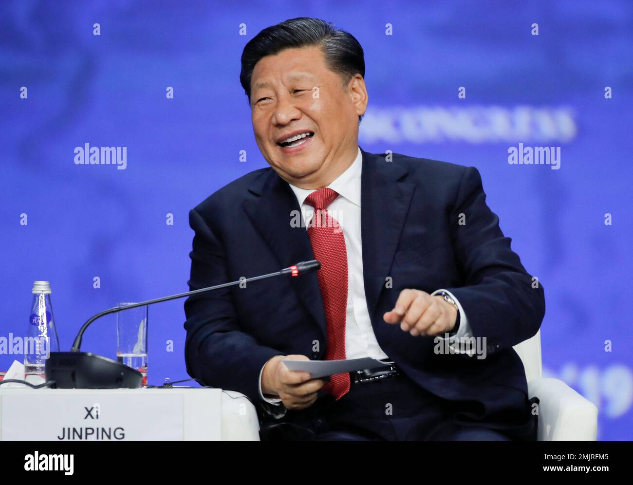 Chinese President Xi Jinping smiles as he attends the St. Petersburg ...