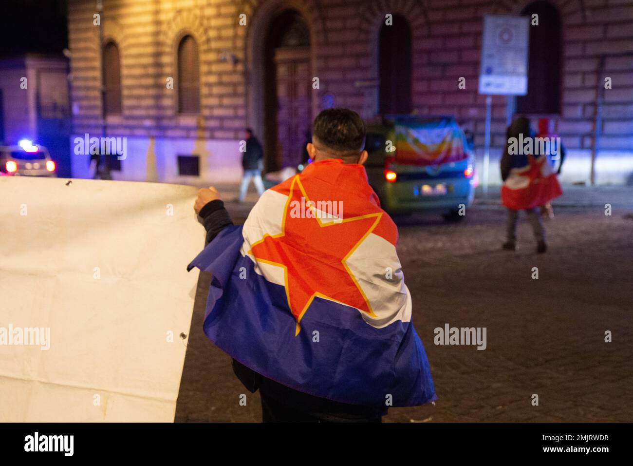 Rome, Italy. 27th Jan, 2023. Torchlight procession on the occasion of Holocaust Remembrance Day to remember the massacres carried out by Nazi-fascism against Rom-Sinti people, homosexuals and disabled people (Photo by Matteo Nardone/Pacific Press) Credit: Pacific Press Media Production Corp./Alamy Live News Stock Photo