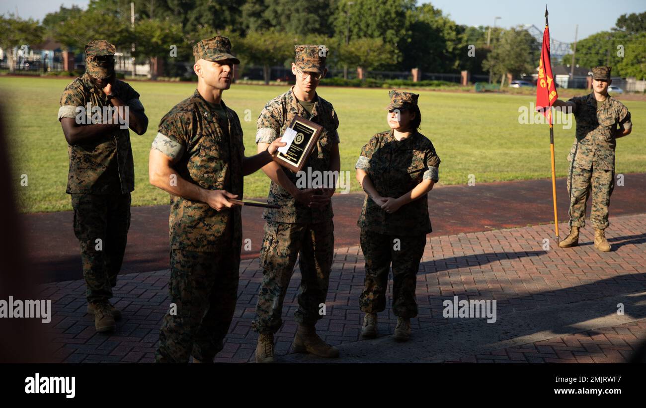 U.S. Marine Corps Col. Jason Burkett (center-left), commanding officer ...